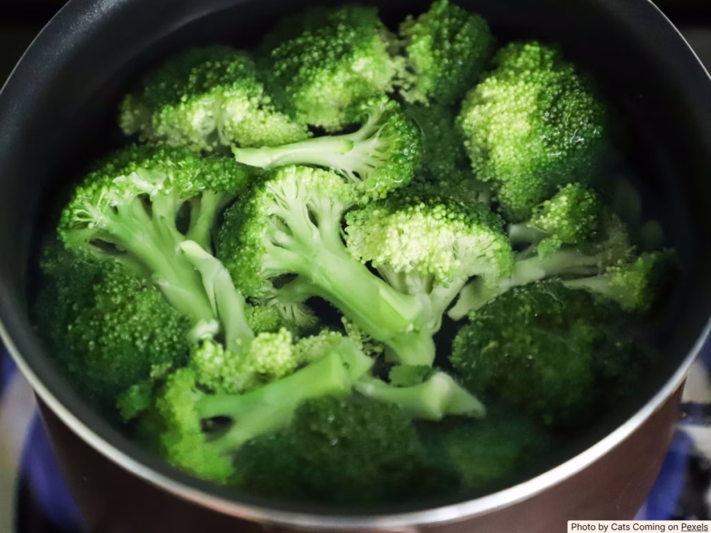 Boiling Brocolli on the stove to blanch the vegetables